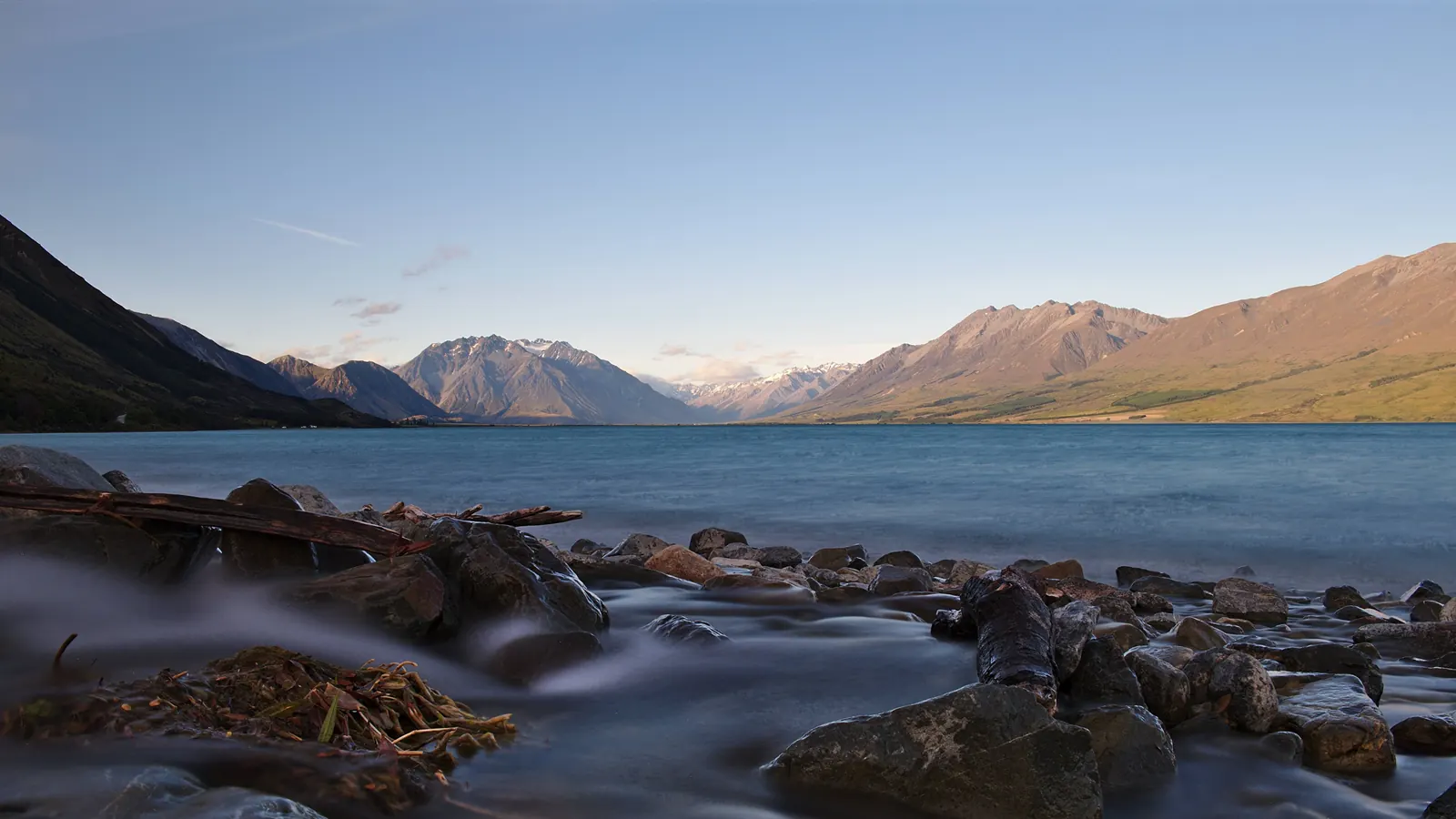 A stream flowing into a New Zealand alpine lake